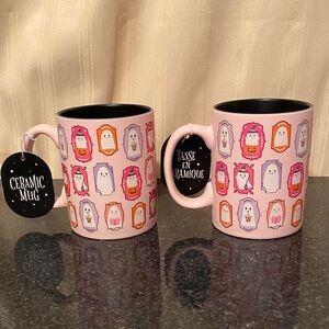 Pair Of Pink Ghost Mugs By Emily Dumas